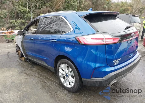 2020 Ford Edge Titanium z USA, uszkodzony, nr VIN 2FMPK3K9XLBA60212